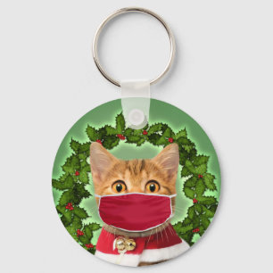 julklapp med koronavirusmask nyckelring