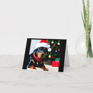 Julkort med Rottweiler med julhatt Helgkort