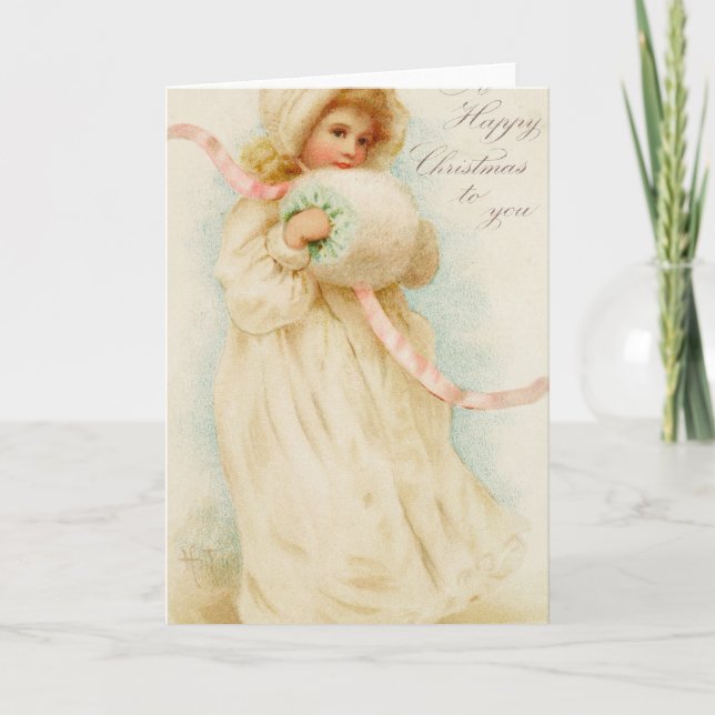 Julkort som skildrar en flicka med muff helgkort (Framsida)