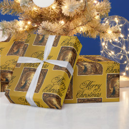 Julkrubba på guldfolie-inslagspapper presentpapper