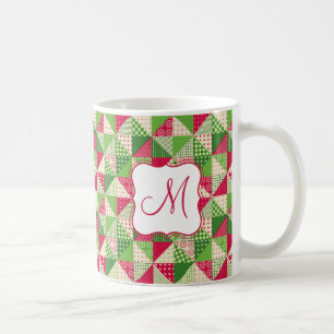 Jullapptäcket med röd grönt färgad mönster. kaffemugg