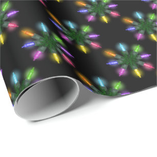 Julljus snöflingor på svart presentpapper