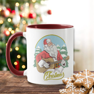 Julmusikalska jultomten som spelar Guitar Winter Mugg