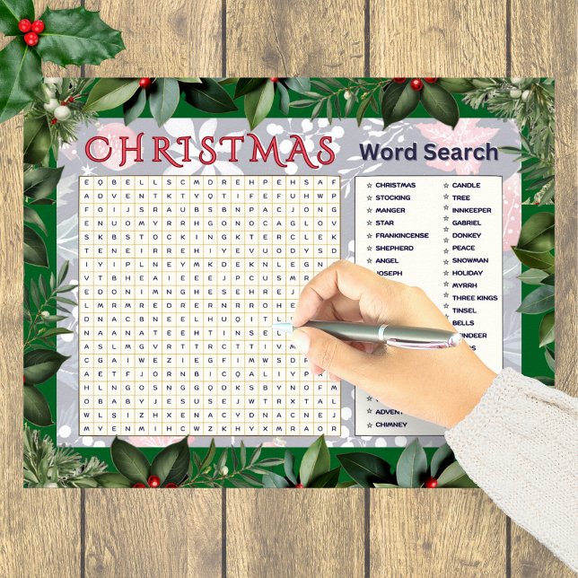 Julordslek Sökordsaktivitet med Festtema Poster (A festive Christmas word search poster with greenery border)