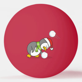 Julpenguin får en snö boll