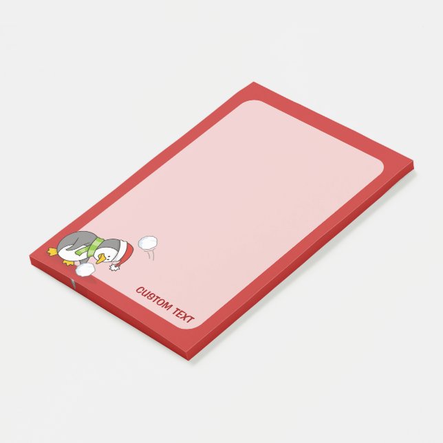 Julpenguin får en snö boll post-it block (Vinklad)