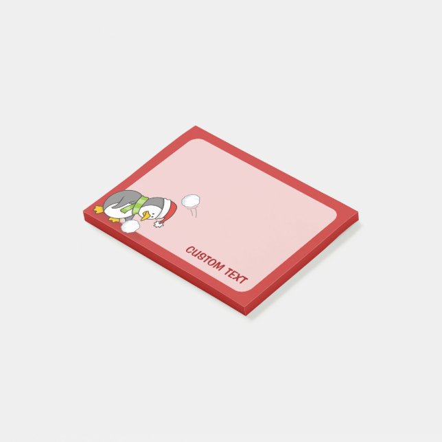 Julpenguin får en snö boll post-it block (Vinklad)