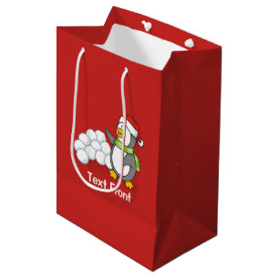 Julpenguin med snö bollar som viftar