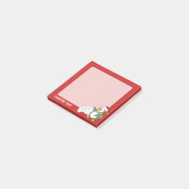 Julpenguin med snö bollar som viftar post-it block