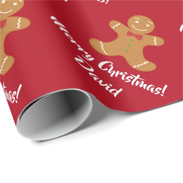 Julpepparkaksgubbe som slår in papper presentpapper (Rullad Hörn)