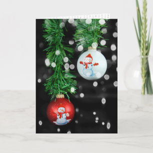 Julprydnadsföremål i snögubbe med trädgårdsmark kort