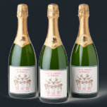 Julrener Jingle & Mingle-Personlig<br><div class="desc">Etiketter för julrenar Jingle & Mingle Festive Party Personlig Namn Sparkling Vin Ebels har fin renar med rosa bows och blommigt accents med texten "Låt oss Jingle & Mingle" i modern kalligrafi för rosa med personlig namn. Perfektens personlig julklapp och helgdagar för familj och vänner. Designad av ©2024 Evco Helgdagars...</div>
