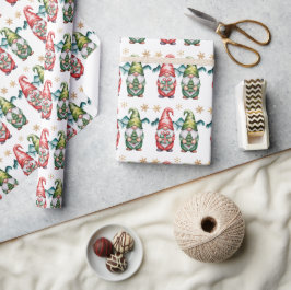 Julröda och gröna tomtar med guld snöflinga presentpapper