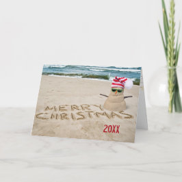 Julsandy snögubbe på stranden helgkort