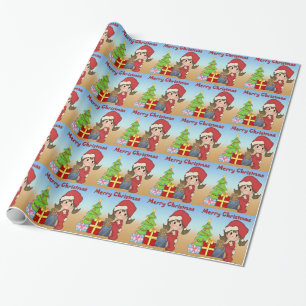 Julsmåbarnflicka som slår in papper presentpapper