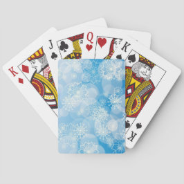 Julsnöflingor på en blå bakgrund casinokort
