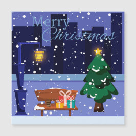 Julstadsbild med gatlykta, träd och gåva