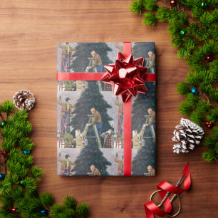 Julstämning, familj som sätter upp ljus på träd presentpapper