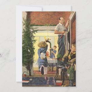 Julstämning, familjen dekorerar huset julkort