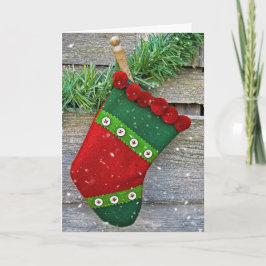 Julstrumpa i snöflingor helgkort