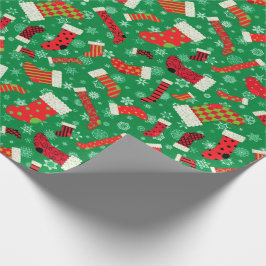 Julstrumpor och snöflingormönster presentpapper