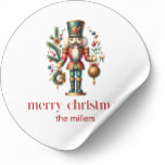 Jultema Nutcracker Runt Klistermärke<br><div class="desc">Den här jultomtemedade designen har en vacker Nutcracker och en röd återtypografi i God jul på en vit bakgrund Anpassningsbar familj namn. Det finns omvänt färg.</div>