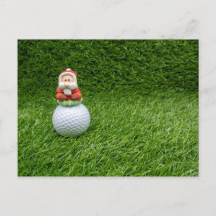 Jultomten är sitta på guldkortet boll vykort