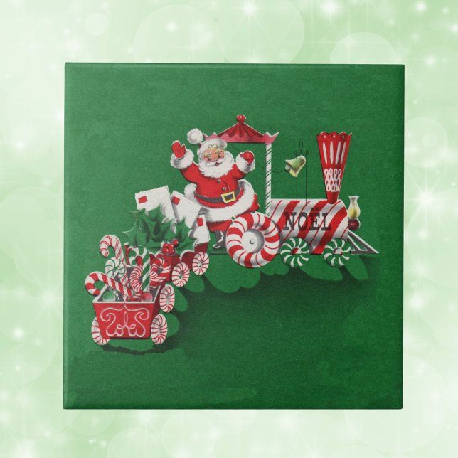 Jultomten Candy Tåg Kakelplatta (Santa riding red and white train with letters candy canes with peppermint wheels on green tile.)