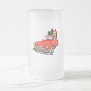 Jultomten i ett rött gammalt timer antique vintage frostat ölglas