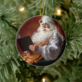 Jultomten läser bok julgransprydnad keramik