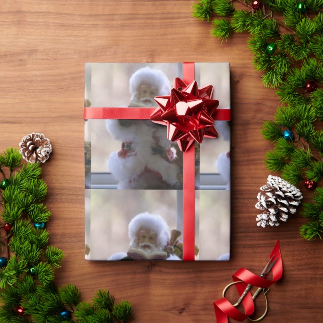 jultomten-läsning av gift presentpapper (Julgåva)