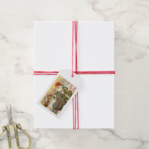 Jultomten matar den Yule geten en kaka Presentetikett