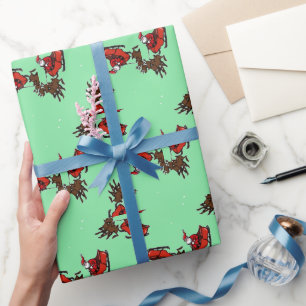 Jultomten med slug på grönt presentpapper