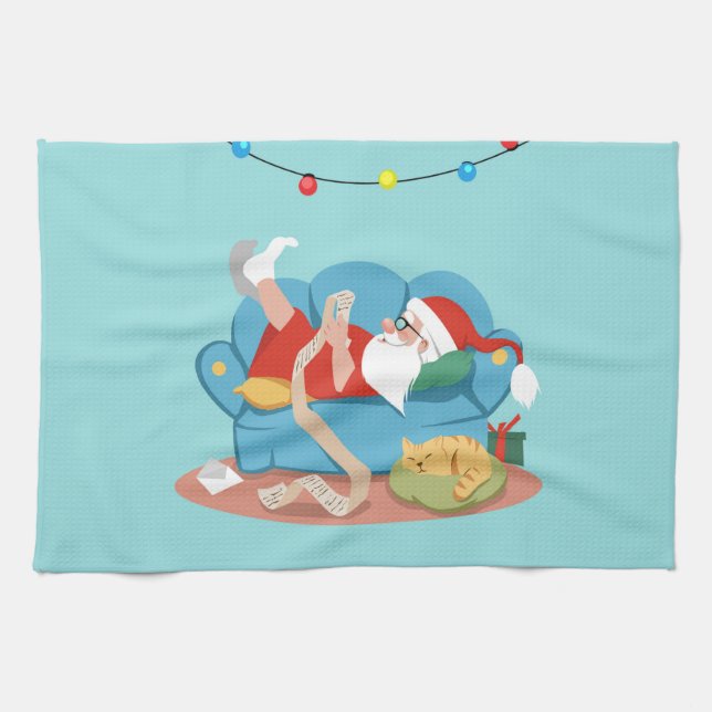 Jultomten på soffan i pyjamas kökshandduk (Horisontell)