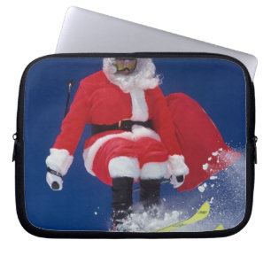 Jultomten skidar på att hoppa av en cornice på laptop fodral