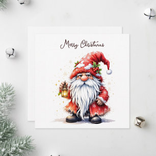 Jultomten som innehåller en glödande lykta. julkort