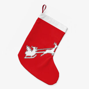Jultomten som sliter sig med renar liten julstrumpa