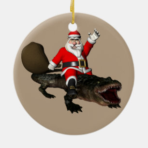 Jultomten som utan fruktan rider en alligator julgransprydnad keramik