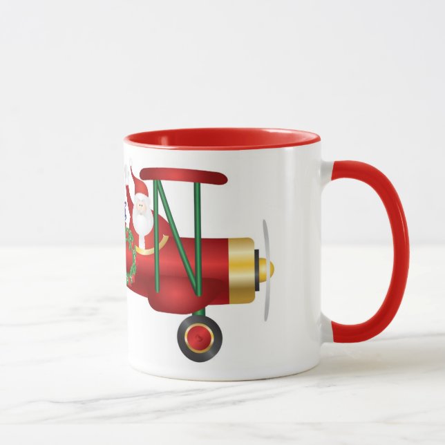 Jultomten som vinkar på biplanen med gåvamuggen mugg (Höger)