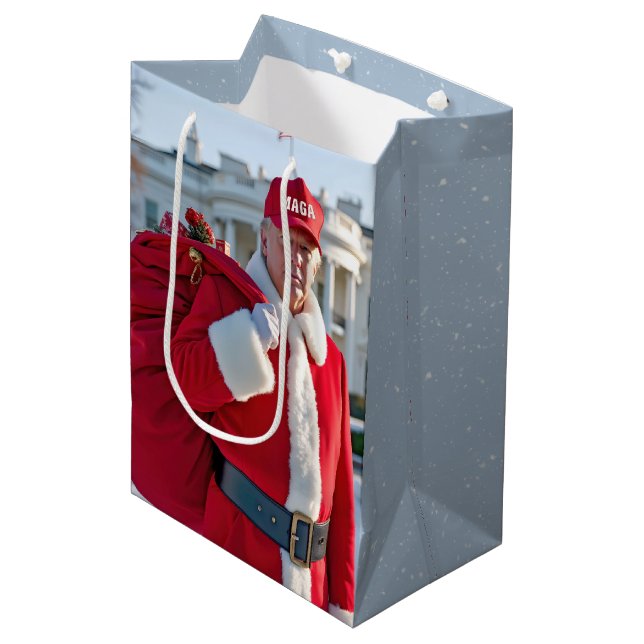 Jultomten-trump med medelstor gåva av rött gift B (Framsidan Vinklad)