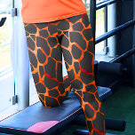 Jungle Giraffe Print Leggings<br><div class="desc">De här benen är vackert designade med en orange som mäter och svarta giraffe-punkter mönster, och de erbjuder ett unikt och snyggt som komplement till din garderoba. Mönster visar de utmärkande och elegant fläckar som är karakteristiska för giraffer och skapar ett sofistikerat och öga-fångstutseende. Bälten är gjorda av högkvalitativ och...</div>