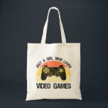 Just A Girl Who Loves Video Games Tygkasse<br><div class="desc">Just A Girl Who Loves Video Games. This funny gamer accessory is a great gift for a woman, girl, teens & kids who love playing video games & computer games. If you're a geek and love console games & computer gaming, this design is for you! Includes a graphic of a...</div>
