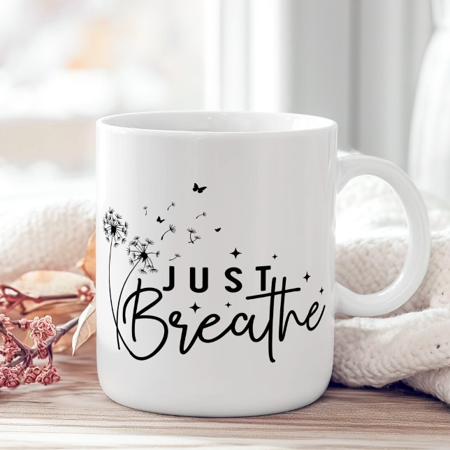 "Just Breathe" Dandelion Butterfly Kaffemugg ("Just Breathe" Dandelion Butterfly Coffee Mug on a boho wooden table with pink flower.)