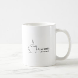 J'y réfléchis. Calmement. Kaffemugg