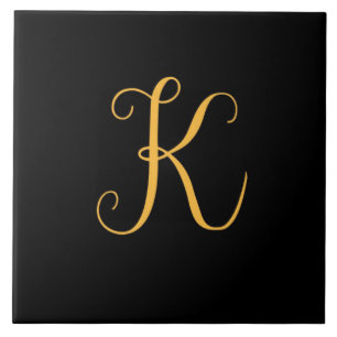 K guld på svart monogram kakelplatta