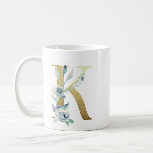 K gyllene inledning med blå blommigt bladverk kaffemugg (Vänster)