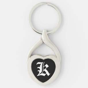 "K" Svart Hjärtnyckelring Twisted Heart Silverfärgad Nyckelring