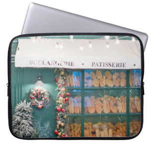Kafébageriets utsida med juldeco laptop fodral