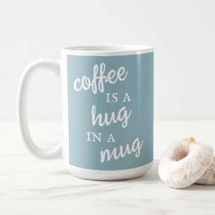 Kaffe är en häckfisk i ett Mugg Muted Blue Mugg
