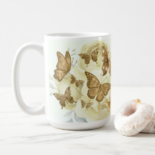 Kaffe kopp med gul och guld fjäril